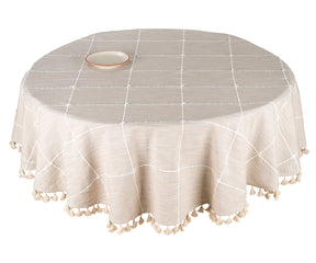 A vibrant round tablecloth neatly draped over a dining table, adding a pop of color to the room.
