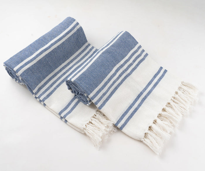 Absorbent cotton towels with elegant striped pattern for home or resort