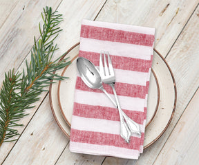 Italian stripe linen napkins for stylish affairs, offering a unique and chic table setting.