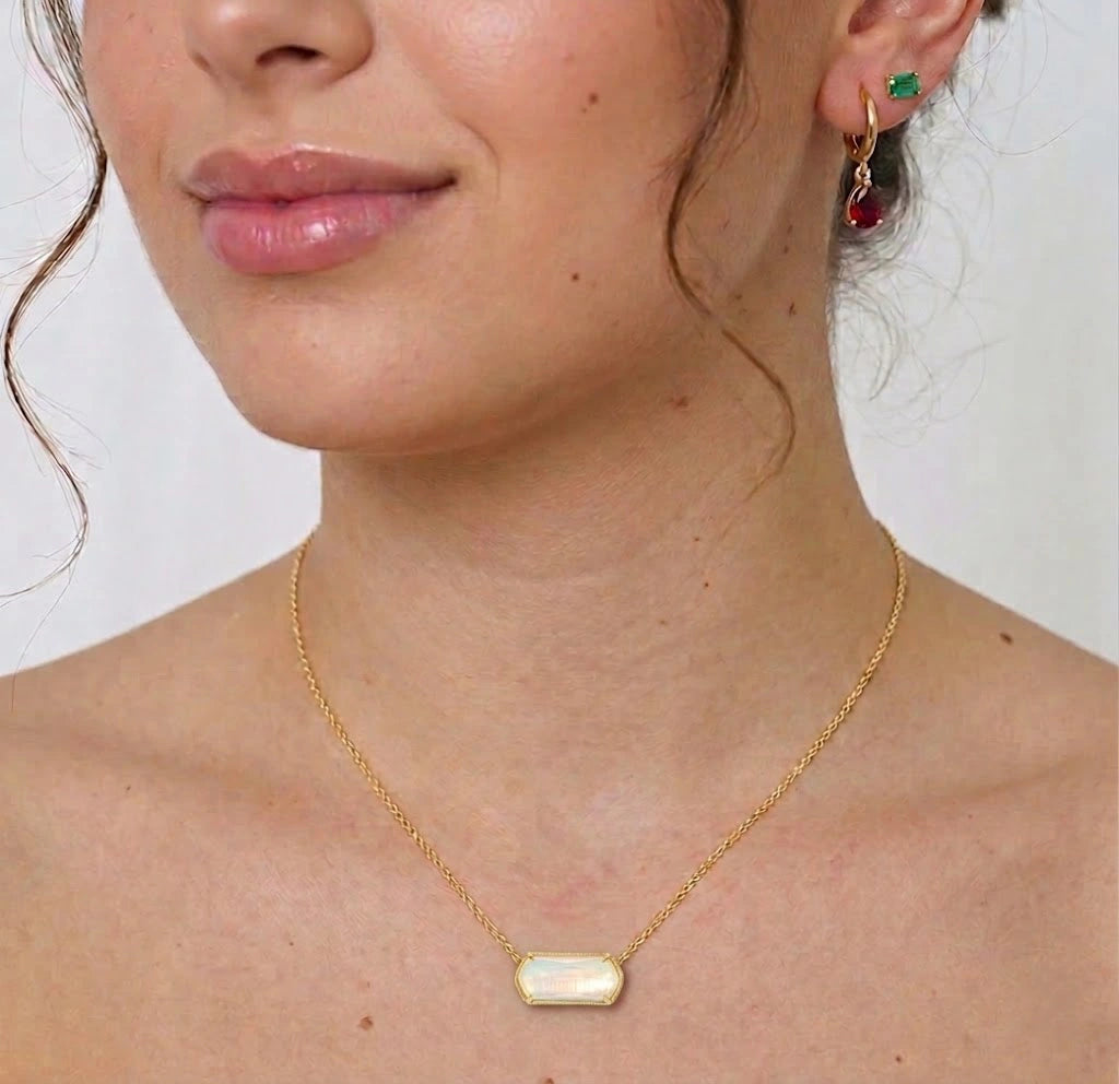 Aura Opal pendant necklace in 18K gold plating. Elegant Aurora opal necklace with adjustable chain, perfect for everyday wear or gifting.
