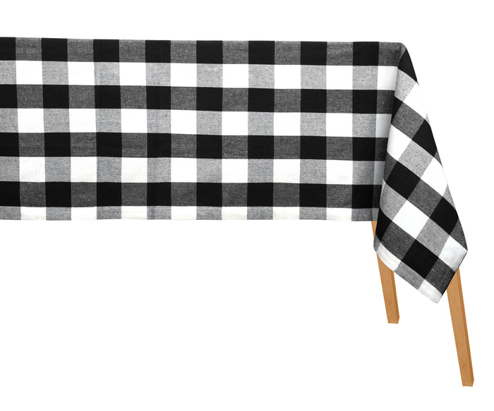 Black and white checkered tablecloth on a wooden table