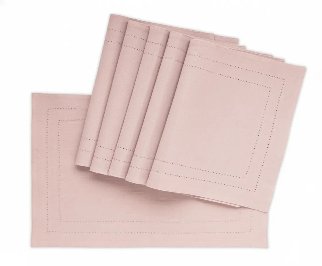 Baby pink double hemstitched cotton rectangular placemat on dining table