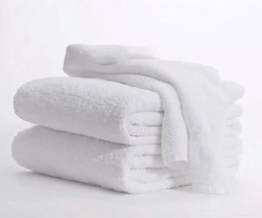 White cotton bath towel made from soft terry cloth
