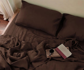 Dark brown linen fitted sheet with matching pillowcases, natural breathable linen bedding