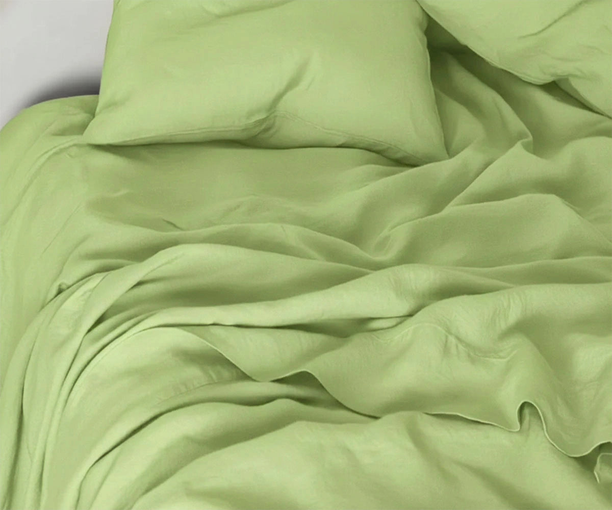 Soft sage green linen fitted sheet with matching pillowcases, breathable natural linen bedding for modern bedroom décor