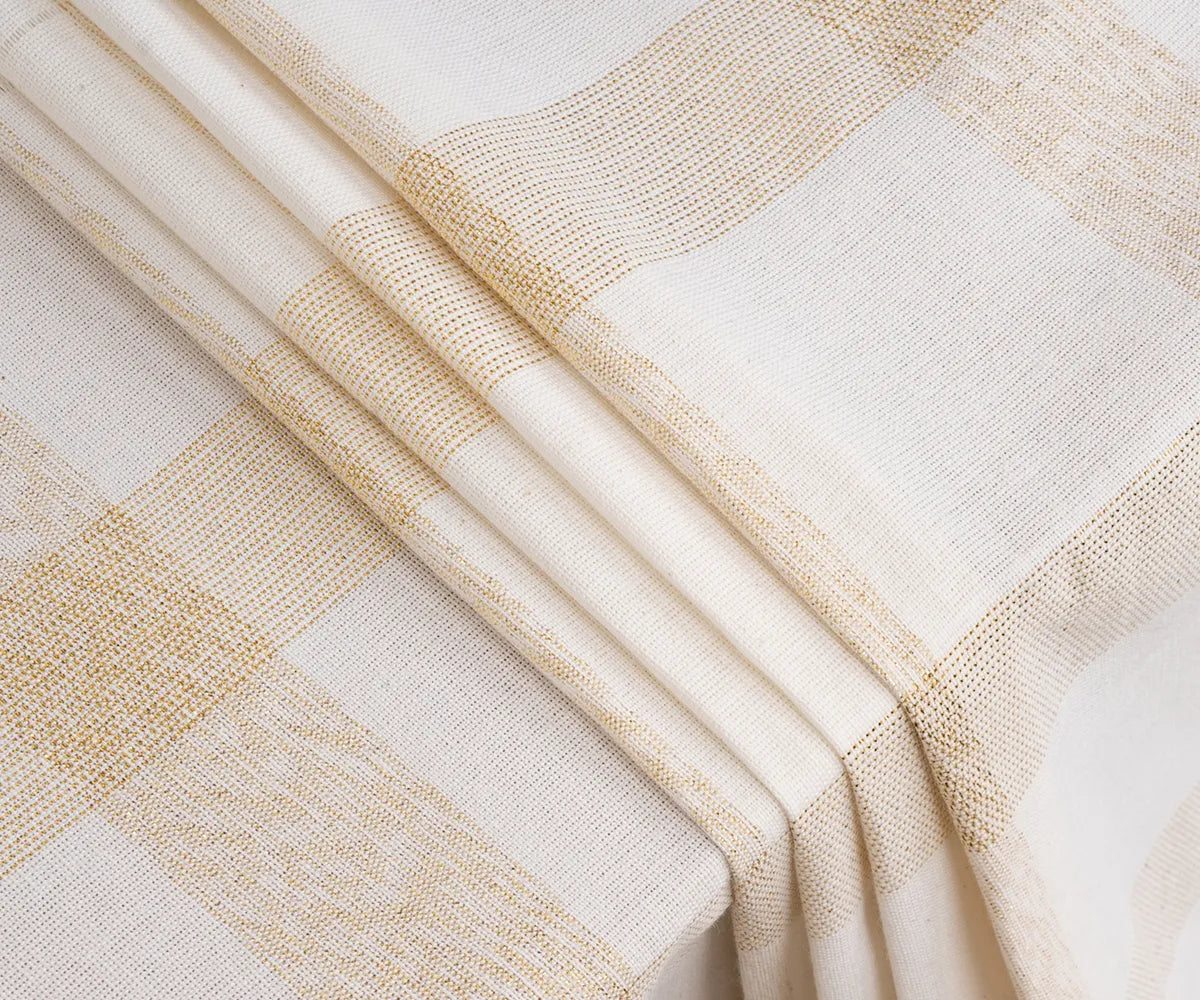 Elegant beige checkered cotton tablecloth perfect for farmhouse or modern dining decor