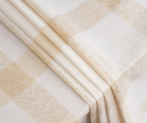 Elegant beige checkered cotton tablecloth perfect for farmhouse or modern dining decor