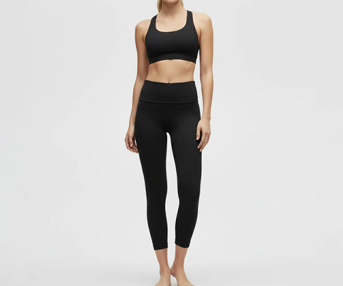 High-waisted black women's leggings for yoga and gym, breathable cotton blend with stretchy, supportive waistband for workouts and everyday wear.