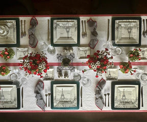 Farmhouse-inspired black striped cotton napkin placed beside silver cutlery.