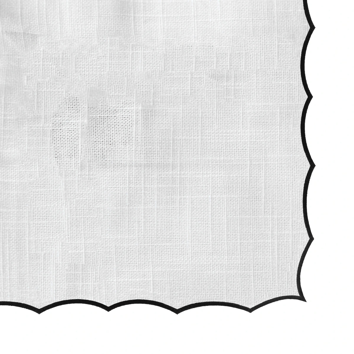 Black and white cloth tablecloth with scalloped edge design, ideal for parties, events, and everyday dining.