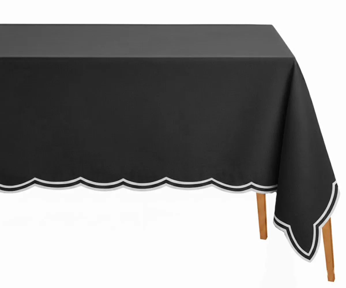 Elegant black cotton rectangle tablecloth with delicate white scalloped embroidery, soft and durable, ideal for dinners, parties, and special occasions.