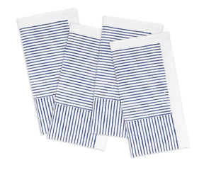 Elegant block print napkins arranged for a casual family meal