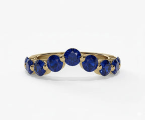 Round cut lab-grown blue sapphire half eternity band ring in white gold