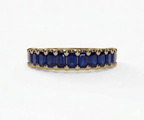 Fine jewelry lab grown sapphire ring with vibrant blue baguette stones