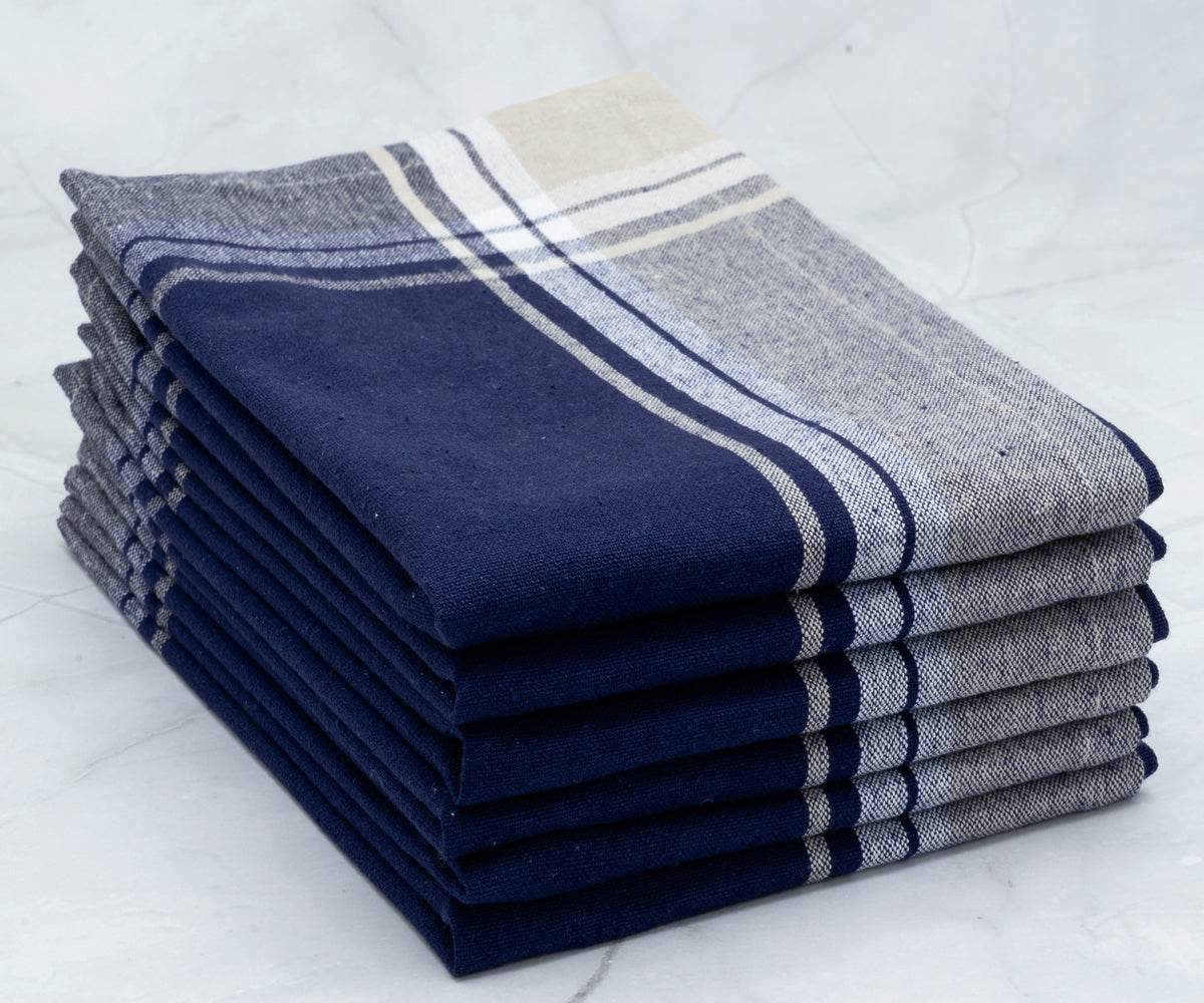 Stack of six restaurant napkins with blue and white stripes