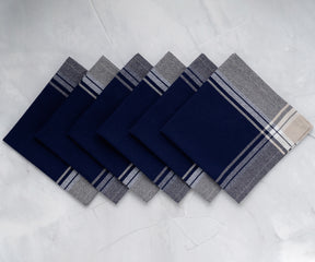 Six bistro napkins featuring blue and white stripes