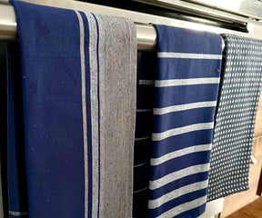 Versatile kitchen towels in a calming blue hue, complementing any home decor.