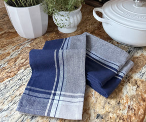 A durable blue kitchen towel, crafted to handle all your cooking and cleaning needs.