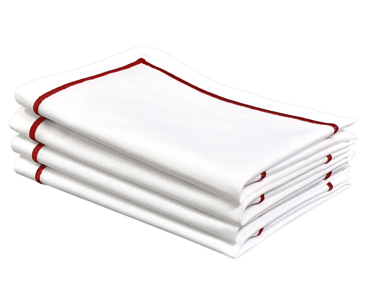 Neatly folded christmas napkins, ready to enhance the dining experience.