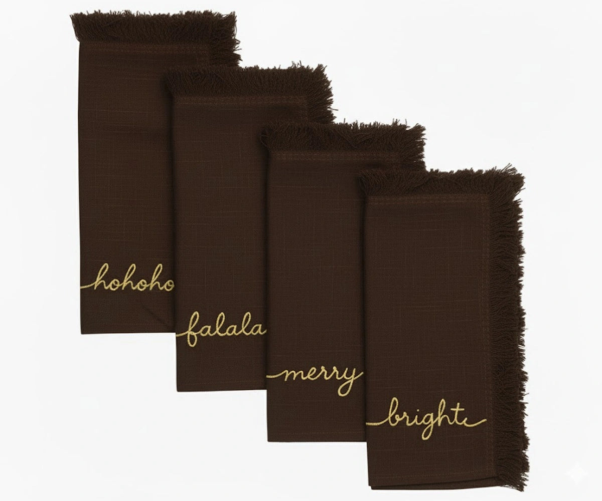 Brown cotton fringe napkins embroidered in gold with Ho Ho Ho, Fa La La, Merry & Bright – rustic Christmas décor