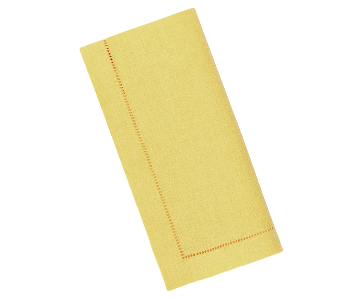 Yellow napkin with a decorative hemtitched