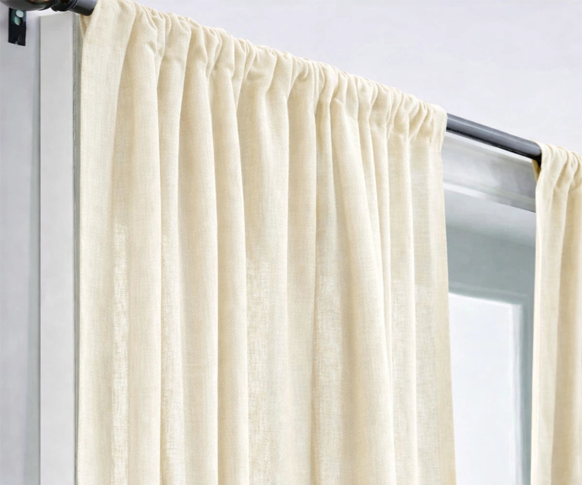 Elegant cream linen window curtains offering light diffusion and privacy, ideal for neutral living room décor, farmhouse style, and timeless interiors.