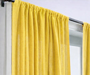 Matcha green linen curtains creating a soothing, nature-inspired living room ambiance, made from eco-friendly linen