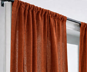 linen curtains bringing earthy warmth and depth to living room windows, crafted from durable linen for a cozy yet sophisticated look.
