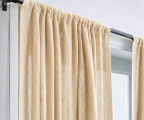 Warm beige linen curtains with a natural texture, designed for calm living room spaces, blending effortlessly with modern and boho décor.