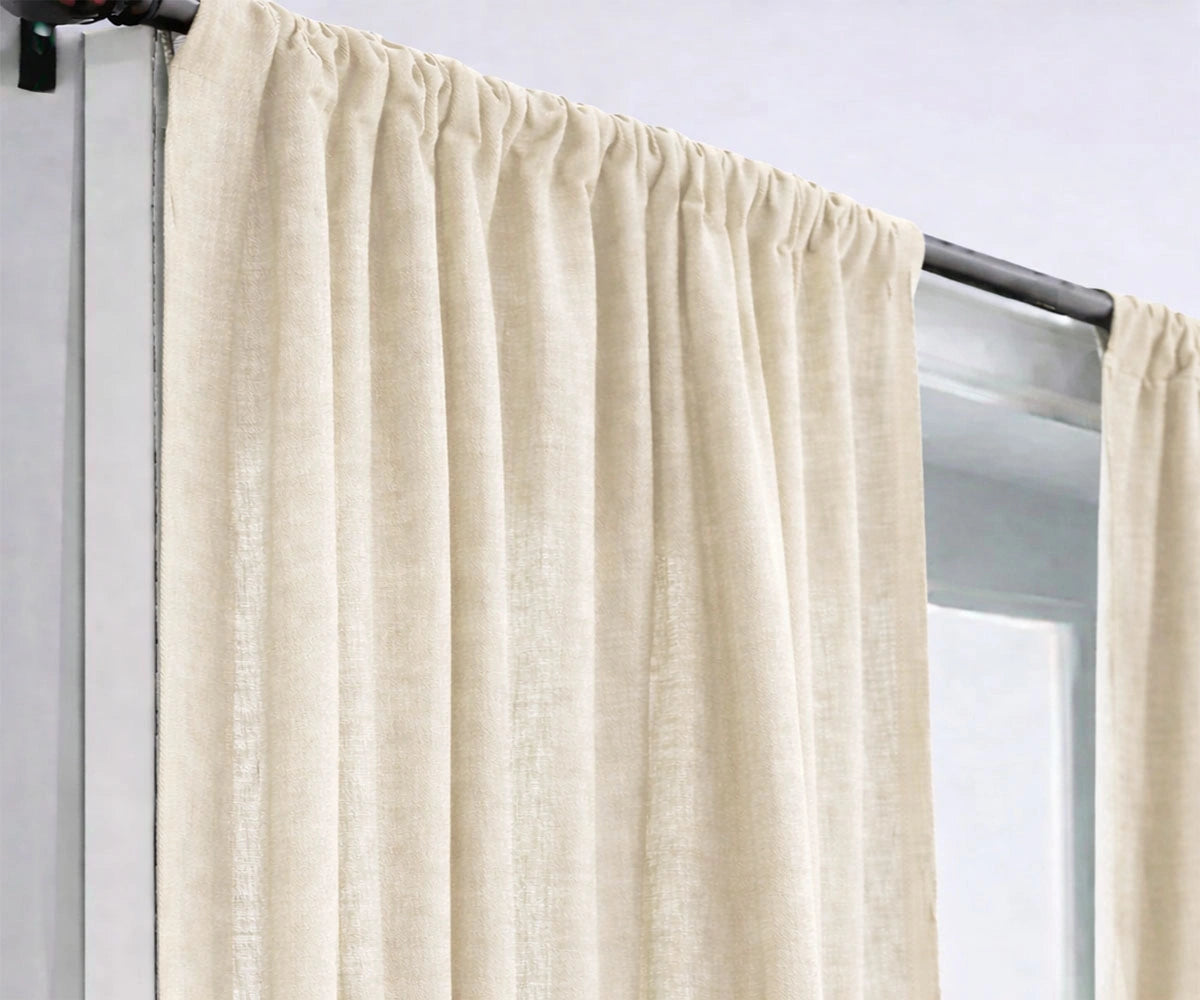 Natural linen curtains showcasing organic texture and neutral tones, perfect for eco-friendly living rooms and relaxed, earthy interiors.