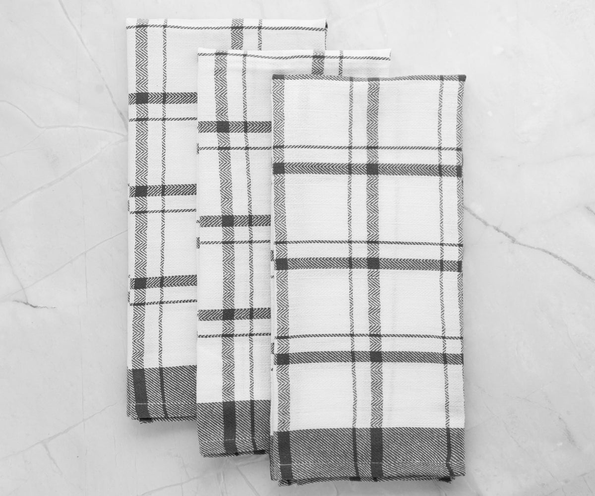 Crisp white kitchen towels for a clean and polished kitchen appearance.