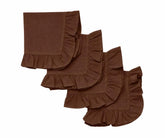 Set of four folded chocolate brown cotton cloth napkins featuring decorative ruffled edges