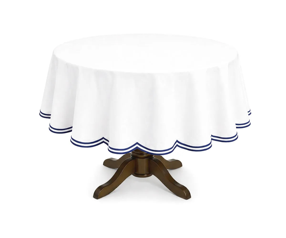 Blue round cotton tablecloth with a subtle double scalloped edge, made from breathable cotton for a neat and polished table setting. Ideal for family dining, brunch gatherings, and casual entertaining on round tables.