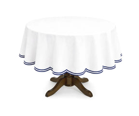 Blue round cotton tablecloth with a subtle double scalloped edge, made from breathable cotton for a neat and polished table setting. Ideal for family dining, brunch gatherings, and casual entertaining on round tables.