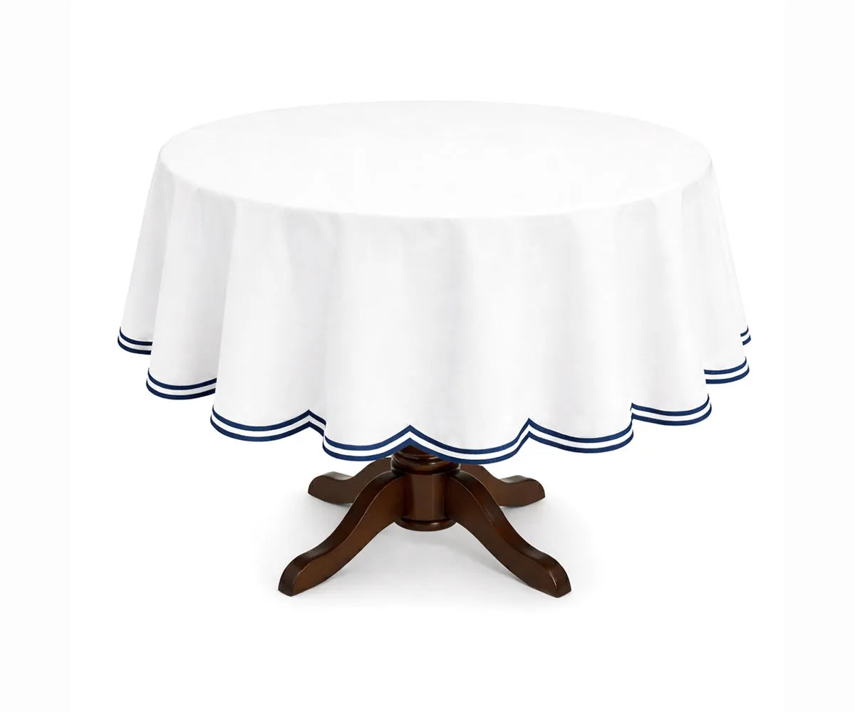 Navy blue round cotton tablecloth designed with a refined double scalloped edge and smooth cotton texture. This round tablecloth adds depth and contrast to dining spaces, perfect for both everyday use and special occasions.