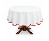 Red round cotton tablecloth with a decorative double scalloped edge, made from 100% cotton for a soft and structured drape. A great choice for holiday tables, festive meals, and seasonal décor on round dining tables.