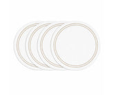 Natural round cotton placemat with white base and detailed embroidery on dining table
