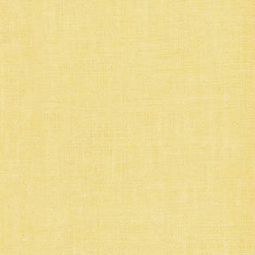 Soft 100% cotton butter yellow napkins displayed in a rustic dining setup