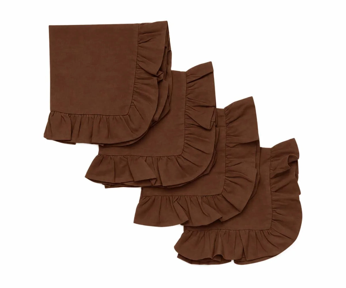 Set of four folded coffee brown cloth napkins featuring decorative ruffled edges