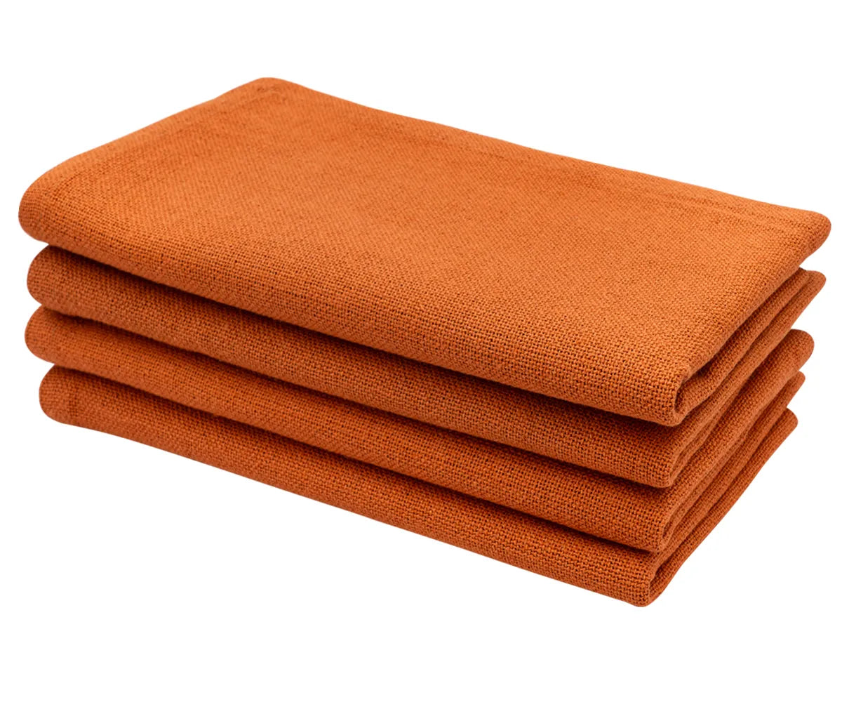 Elegant coral table napkins for weddings and celebrations – adds warmth and sophistication to round or rectangular table setups.
