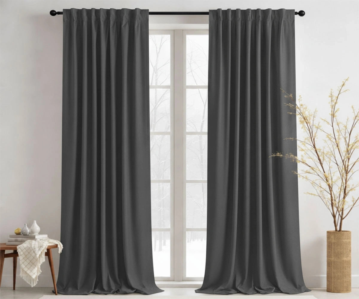 Light gray cotton curtains styled in a neutral room