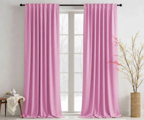Blush pink cotton curtains adding soft color to space