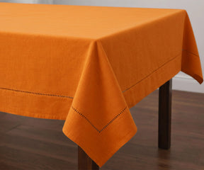 Solid Pumpkin cotton tablecloth with stitched hem