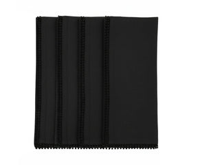 Black cotton pom pom edge napkin with decorative knotted trim