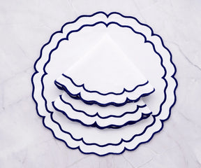 Stylish cotton placemats in white and royal blue for table setup