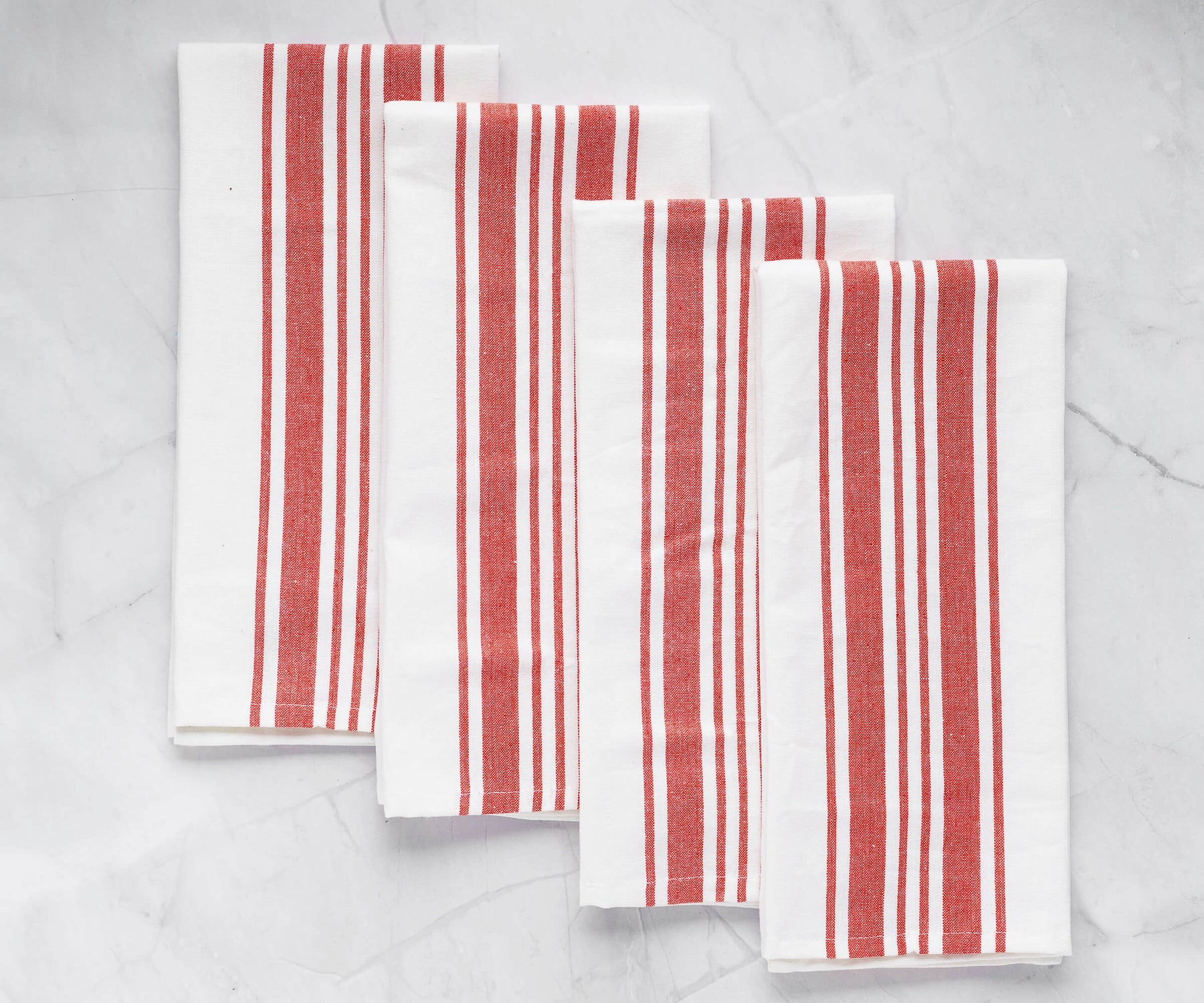 Set of four red and white striped hanging towels for the kitchen