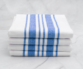 Pile of four kitchen towels, each with blue and white stripes