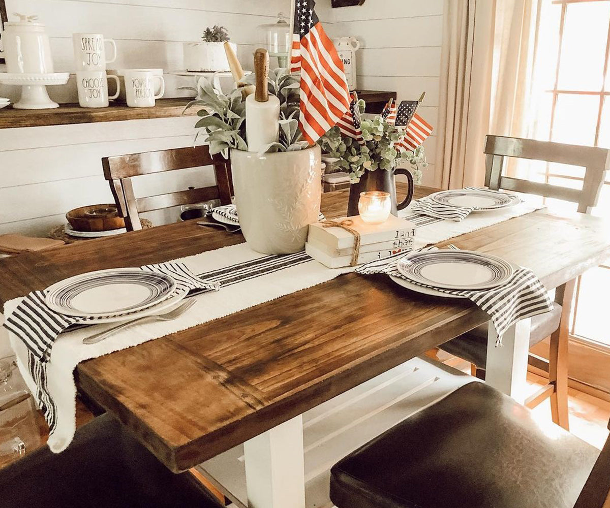 Striped table runner enhances your dining room decor.