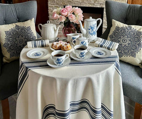 Decorate your table with Navy round tablecloths that add festive cheer to any gathering.