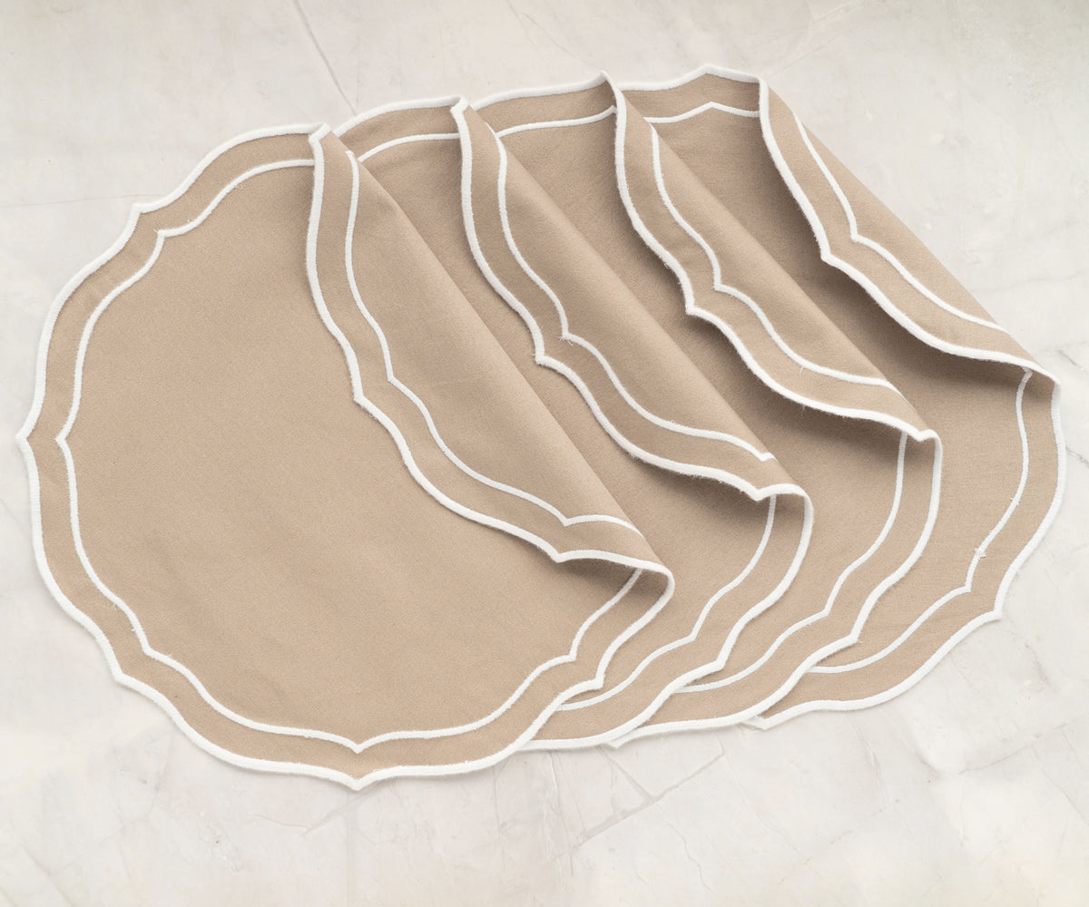 Elegant round placemat placed under a dinner plate